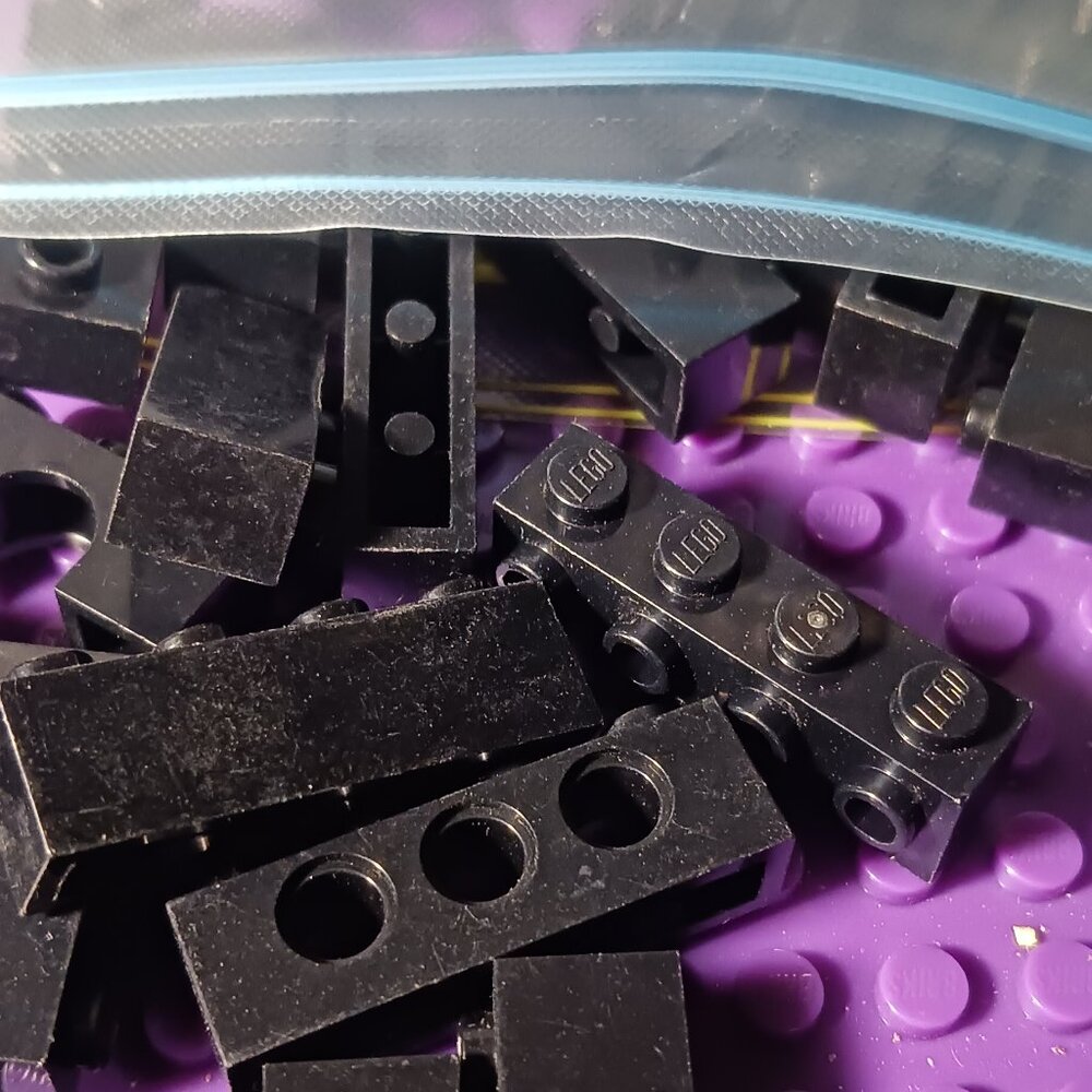 Lego Black 1x4 bricks and Misc. 1.9 oz mix of Bricks